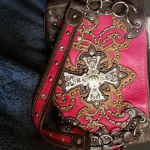 Pink purse with embellished cross